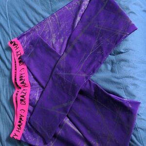 Zumba Fitness "Crazy Happy" purple leggings.
